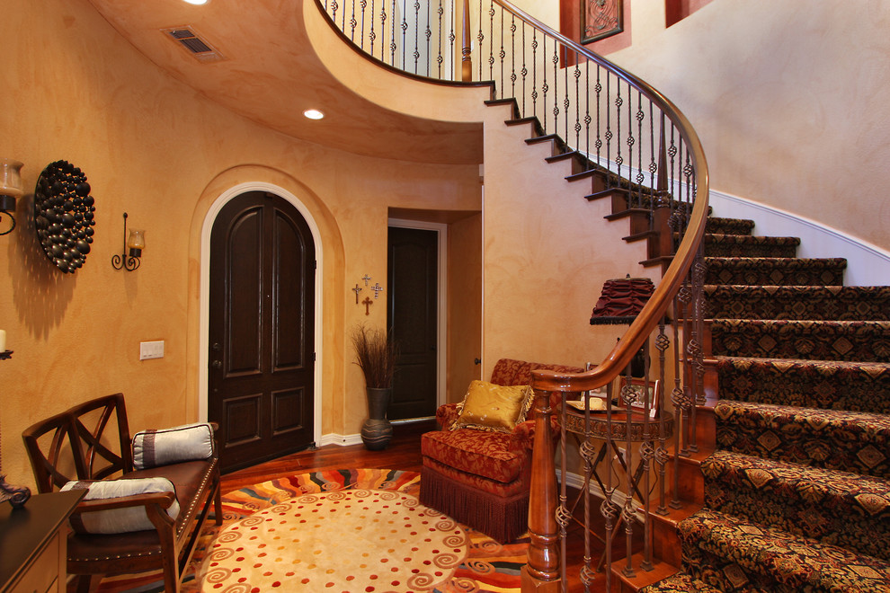 Eclectic foyer in San Diego with beige walls, dark hardwood flooring, a single front door and a dark wood front door.