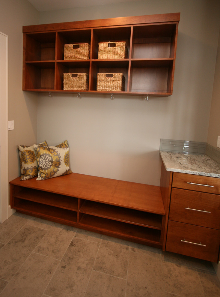 Photo of a small contemporary boot room in Seattle with grey walls and porcelain flooring.