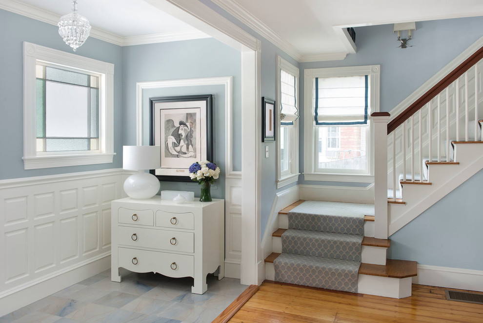 Inspiration for a timeless foyer remodel in Boston with blue walls