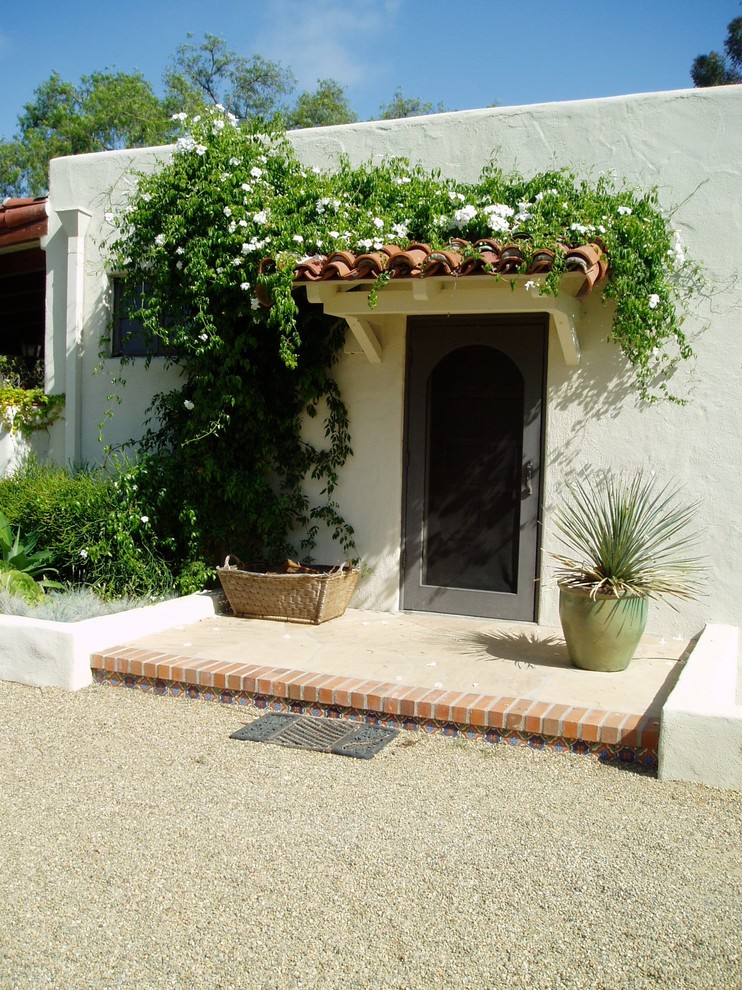 Tuscan entryway photo in San Diego