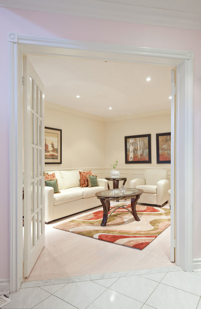Inspiration for a medium sized contemporary hallway in Toronto with white walls and carpet.