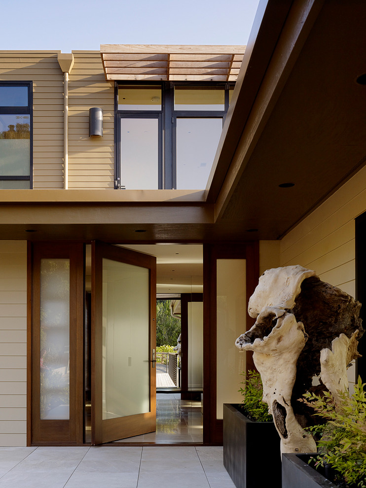 Photo of a contemporary front door in San Francisco with a single front door and a glass front door.