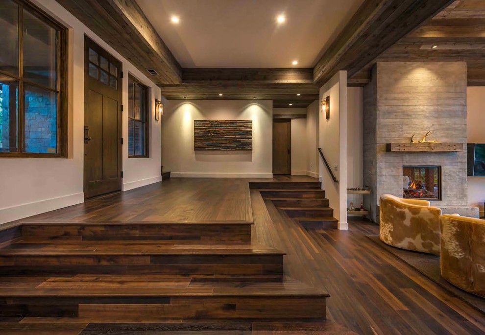 Inspiration for a rustic entrance in Sacramento with dark hardwood flooring, a single front door and a dark wood front door.