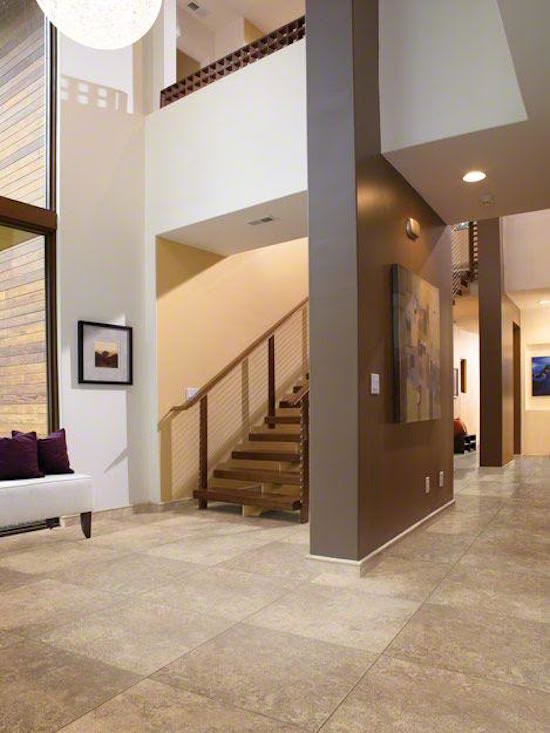 Foyer - large contemporary foyer idea in Phoenix with white walls