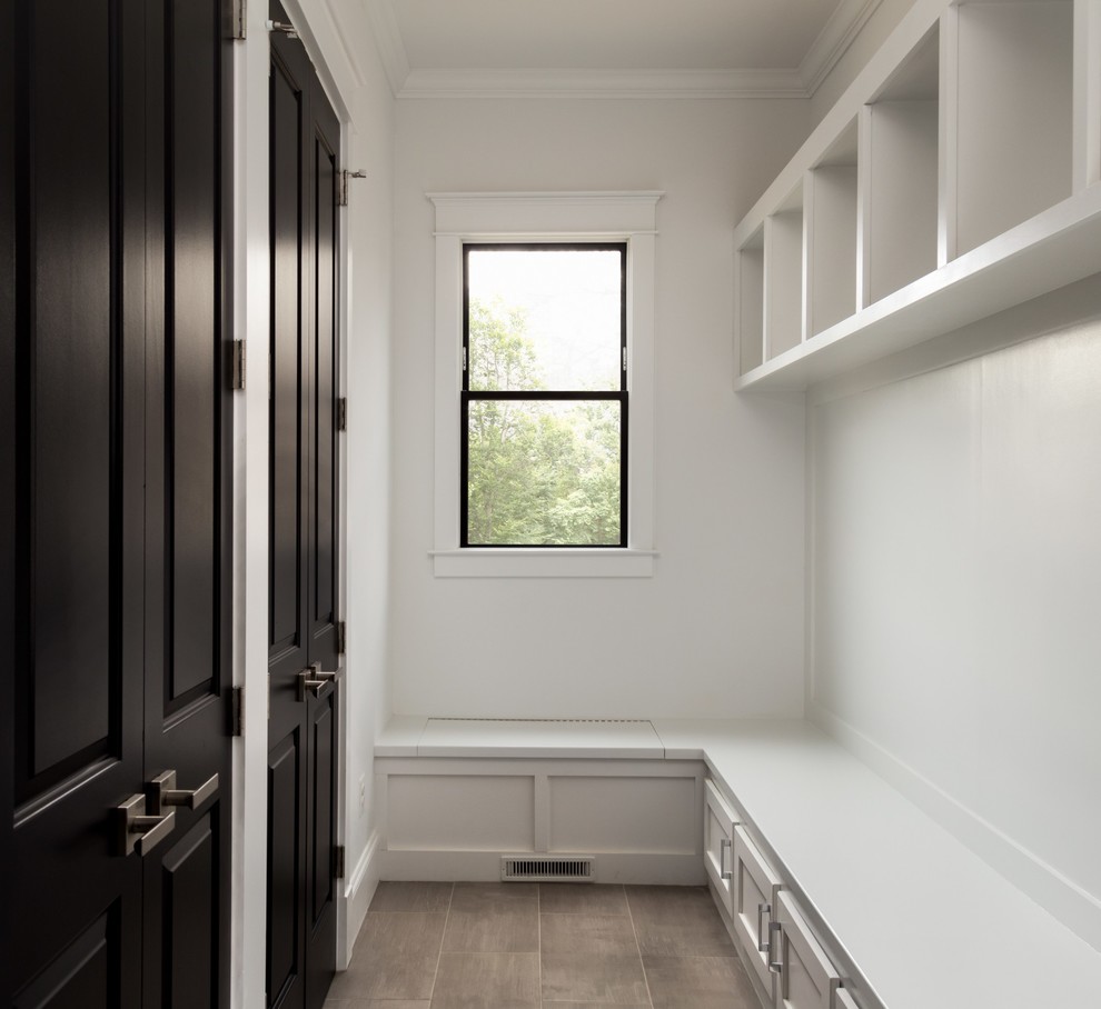 Mid-sized trendy porcelain tile mudroom photo in DC Metro with white walls