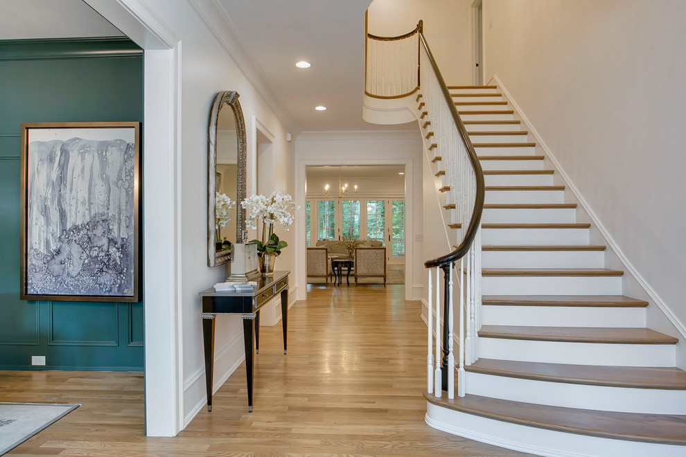 Elegant foyer photo in Raleigh with white walls