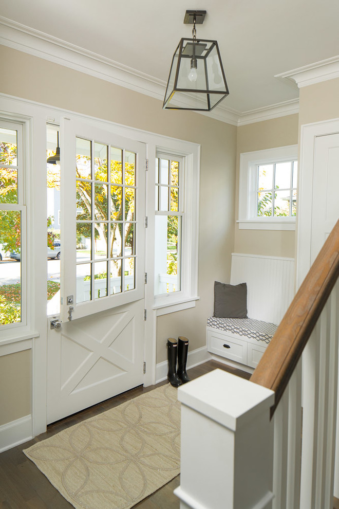 Photo of a large classic foyer in Seattle with white walls, a stable front door and medium hardwood flooring.