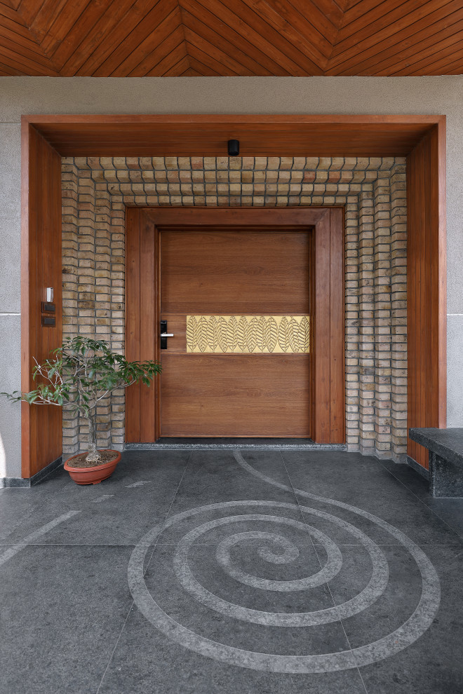 Inspiration for an asian entryway remodel in Ahmedabad
