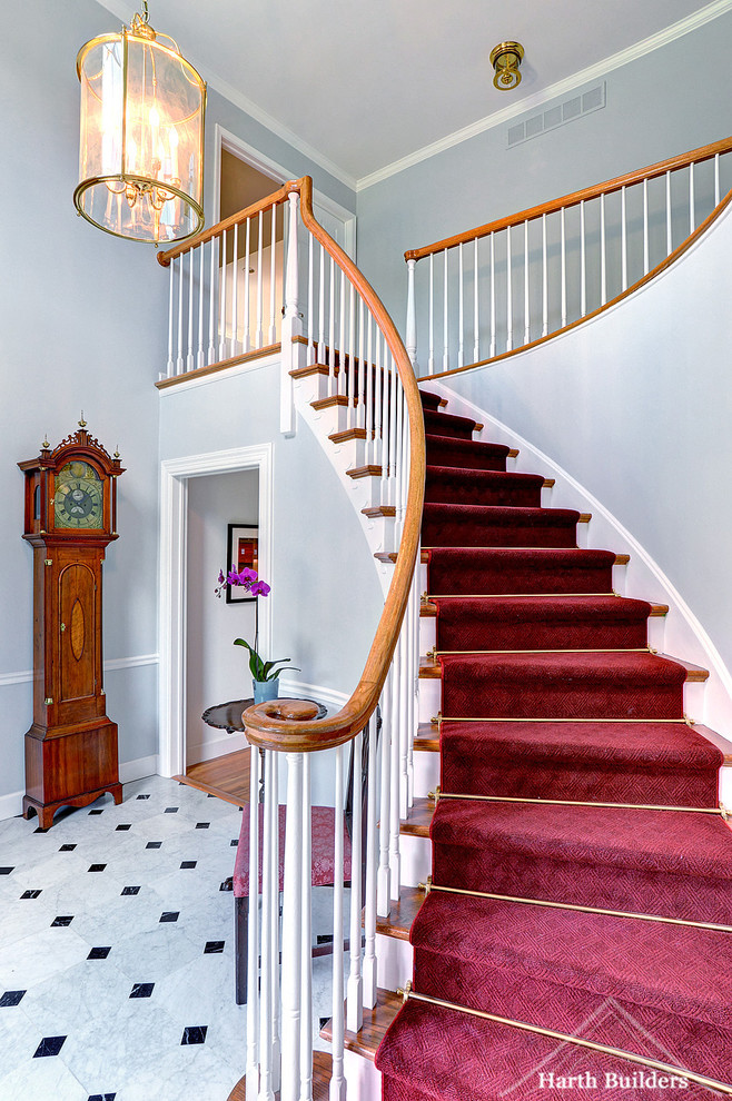Example of a large classic staircase design in Philadelphia