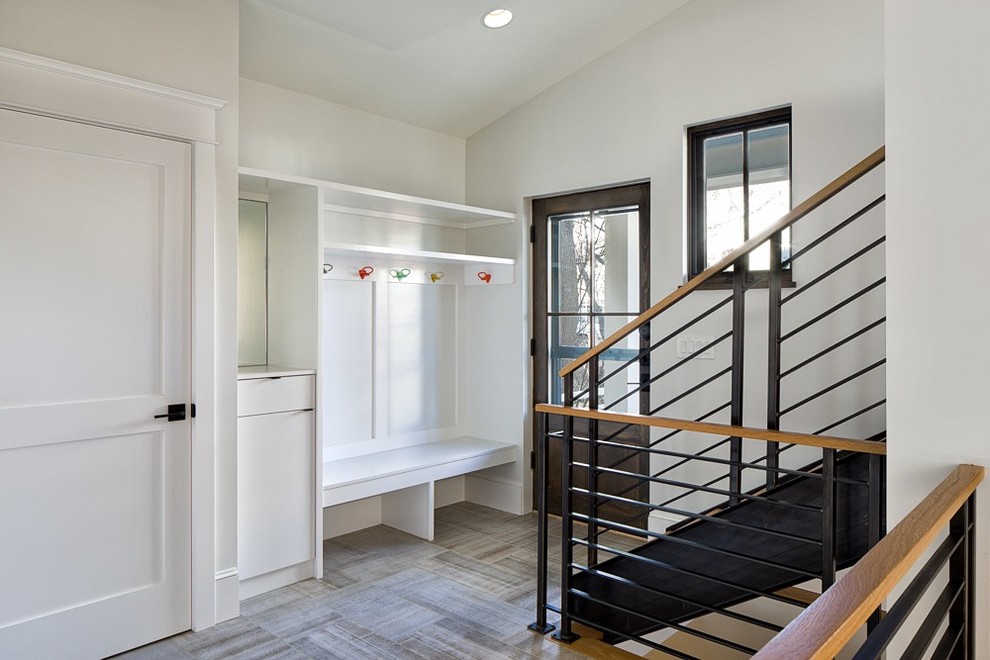 Inspiration for a mid-sized transitional porcelain tile and gray floor mudroom remodel in Denver with white walls