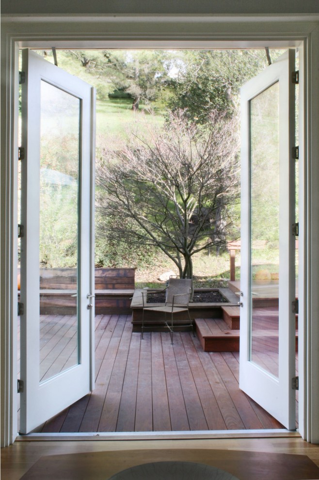 Transitional double front door photo in San Francisco with a glass front door