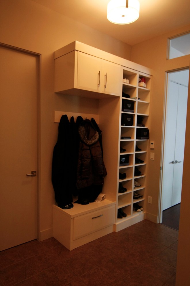 Design ideas for a small contemporary boot room in Vancouver with a single front door.