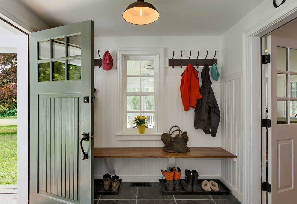 Mudroom - cottage mudroom idea in New York