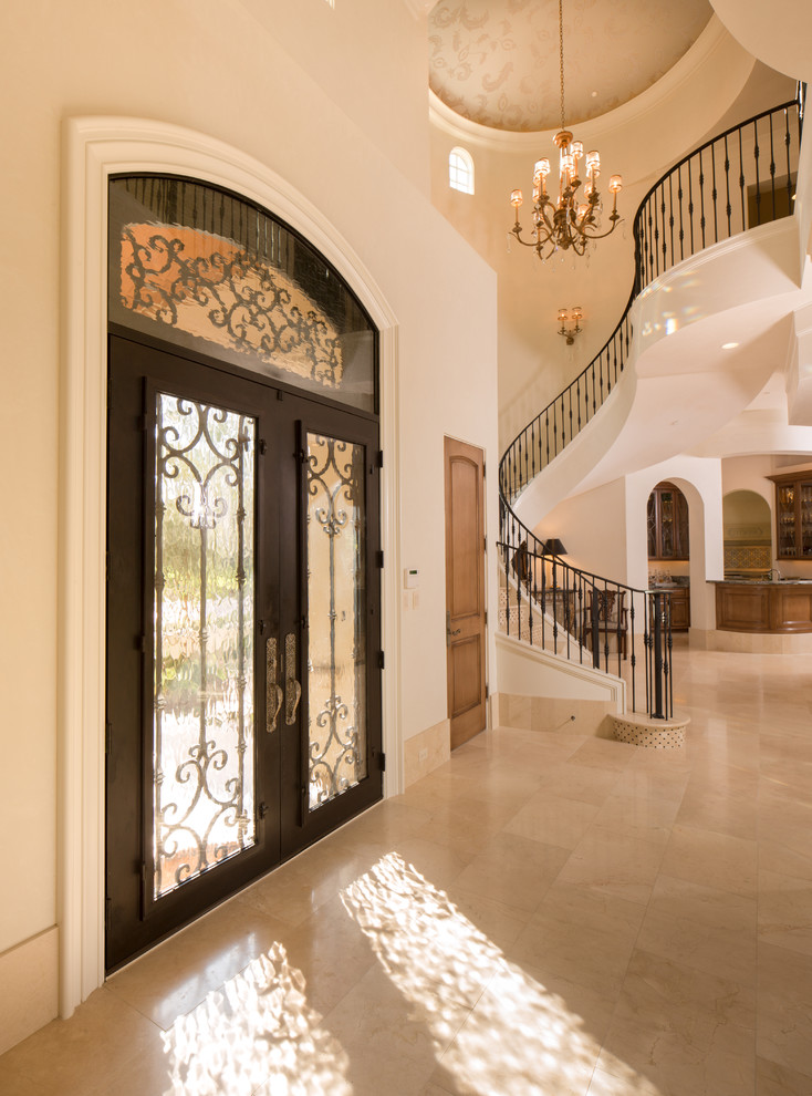 Tuscan entryway photo in Houston