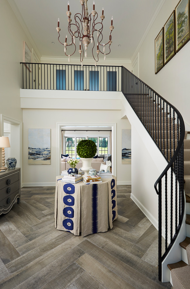 Design ideas for a medium sized nautical foyer in Minneapolis with white walls, grey floors, dark hardwood flooring and feature lighting.
