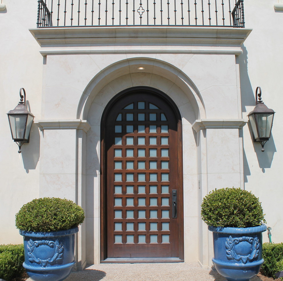 This is an example of a mediterranean entrance in Dallas.