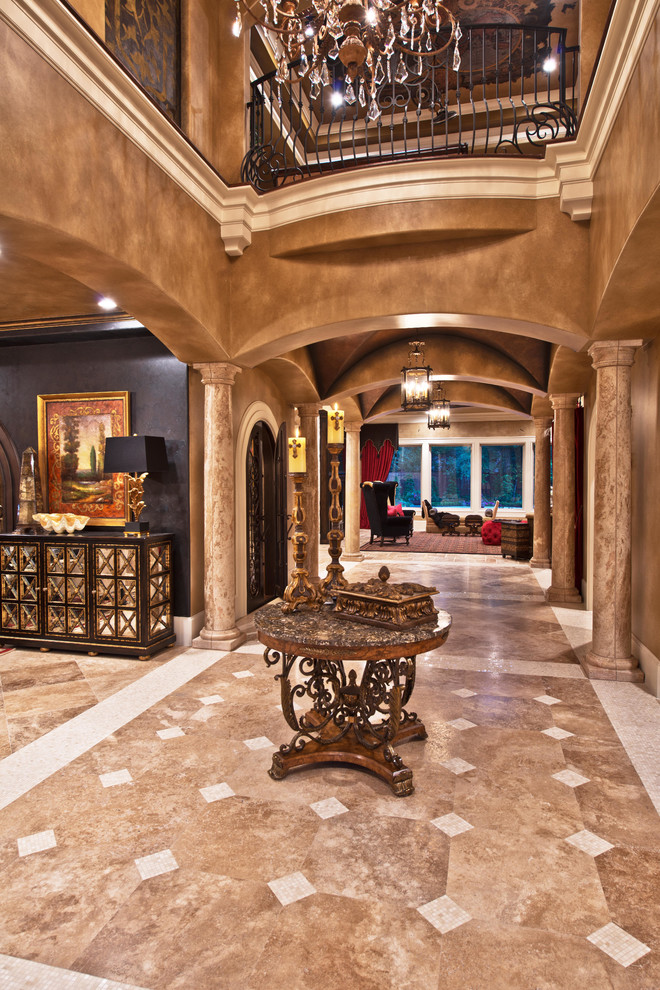 Inspiration for a timeless travertine floor entry hall remodel in Houston with beige walls