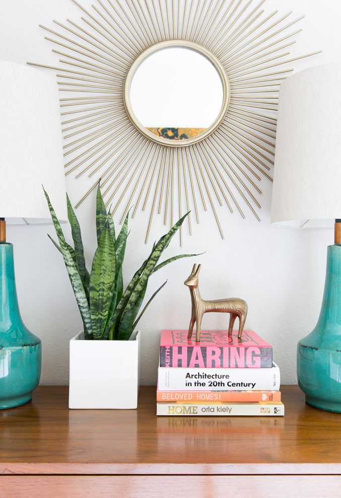 Inspiration for a mid-sized mid-century modern foyer remodel in Austin with gray walls