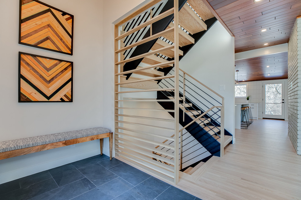 Inspiration for a mid-century modern entryway remodel in Minneapolis