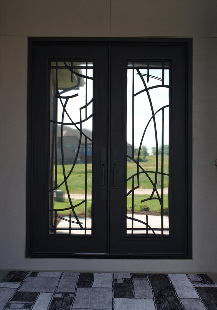 デンバーにある中くらいなおしゃれな玄関ドア (金属製ドア) の写真