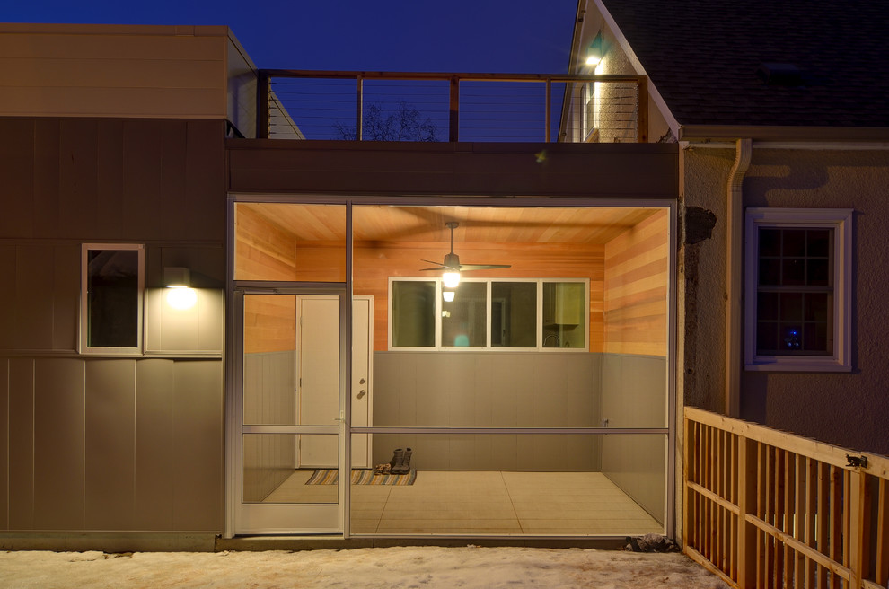 Photo of a contemporary porch in Minneapolis with grey walls.
