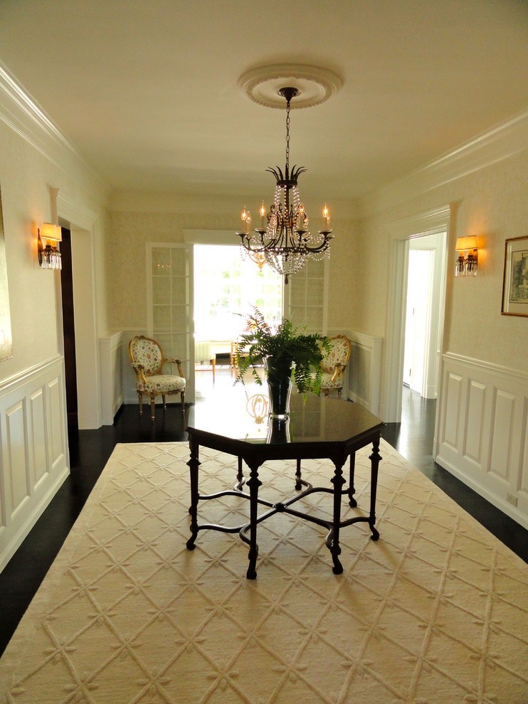 Inspiration for a traditional entrance in Minneapolis with beige walls and a dado rail.