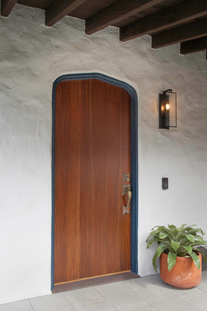Example of a mid-sized tuscan entryway design in San Diego