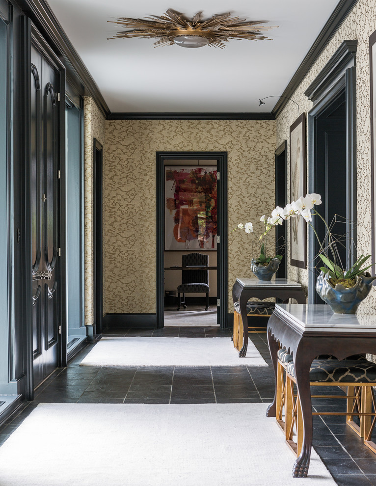 This is an example of a large traditional hallway in Kansas City with metallic walls, slate flooring, a double front door and a black front door.