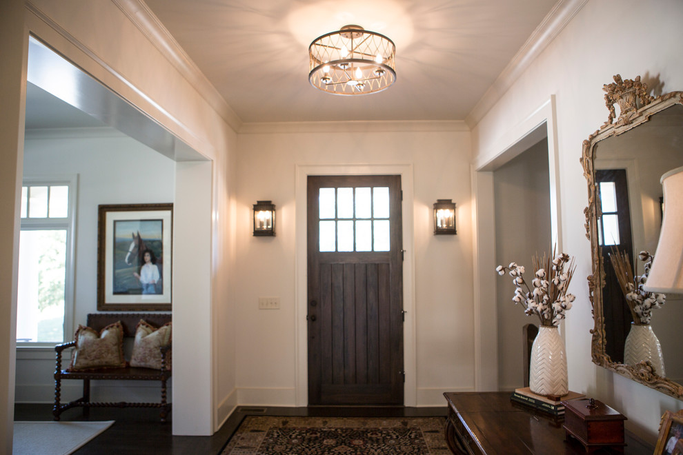Entryway - mid-sized country dark wood floor entryway idea in Atlanta with white walls and a dark wood front door