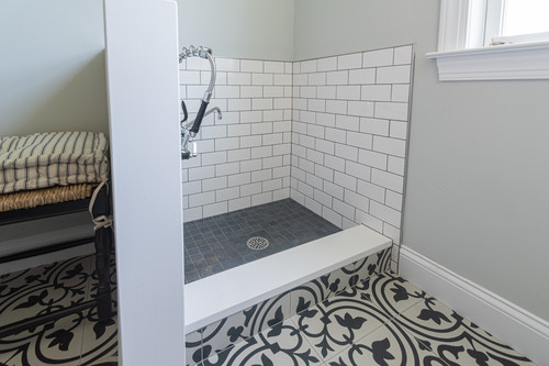 Best Dog Wash Station Ideas for Home - 75+ Photos - Dog wash with white subway tile with gray grout and matching gray square tiles on the floor of the shower. 