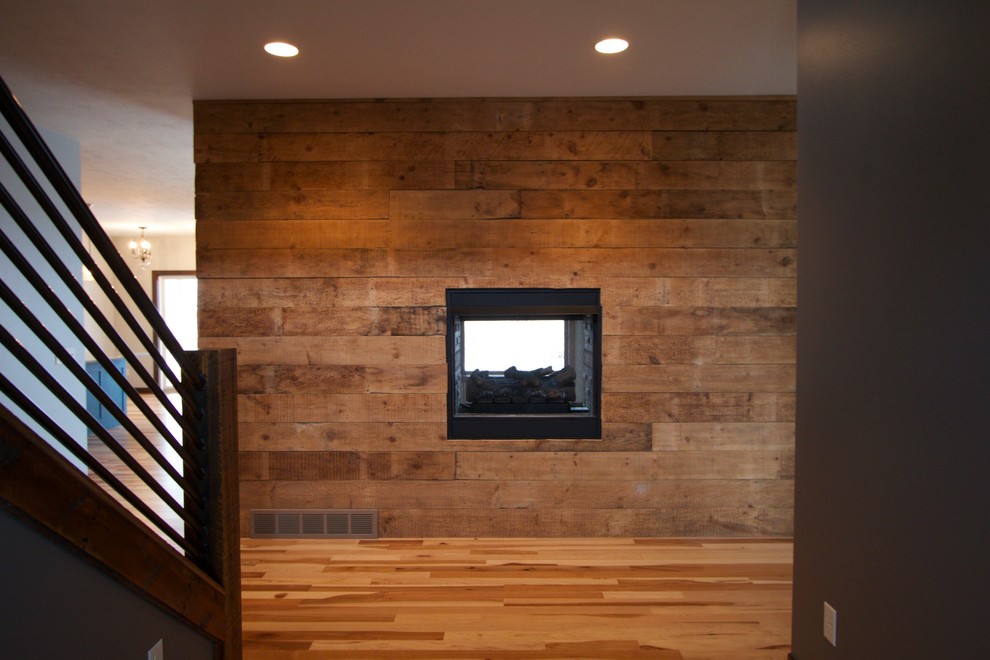 Foyer - farmhouse light wood floor foyer idea in Other