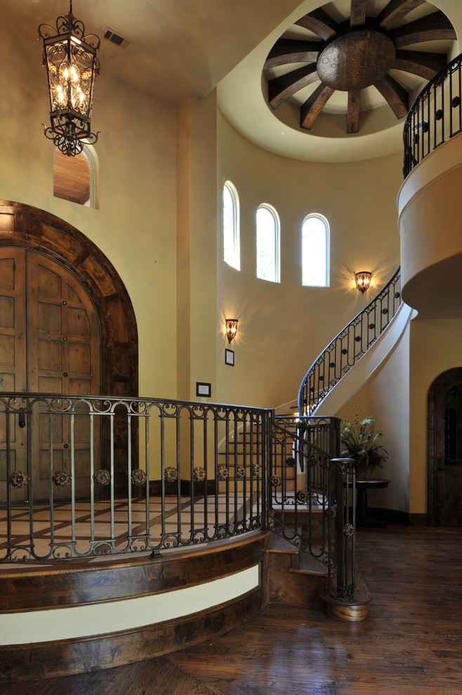 Photo of a large mediterranean staircase in Dallas.