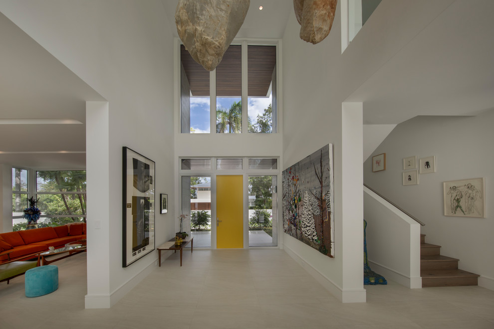 Expansive modern foyer in Miami with white walls.