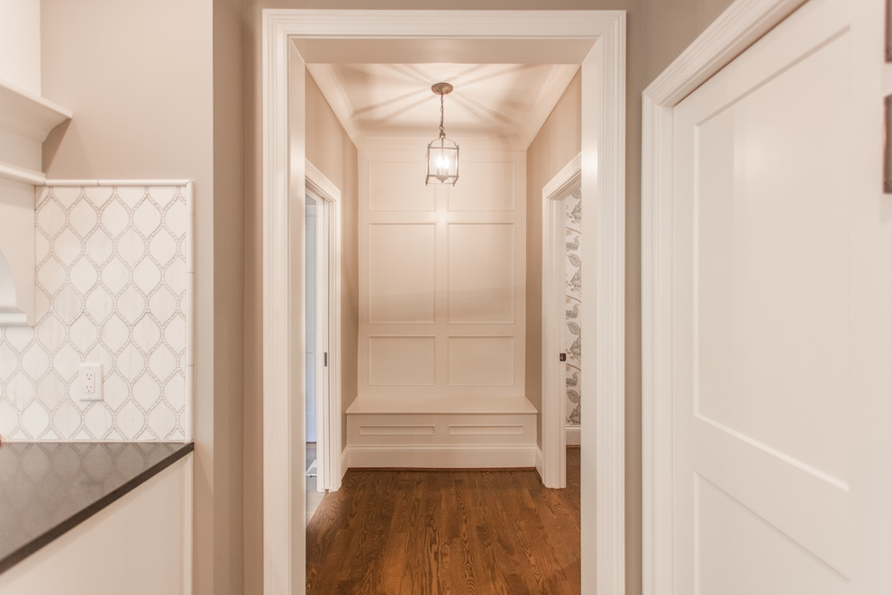 Inspiration for a large transitional dark wood floor and brown floor entryway remodel in Cincinnati with gray walls and a dark wood front door