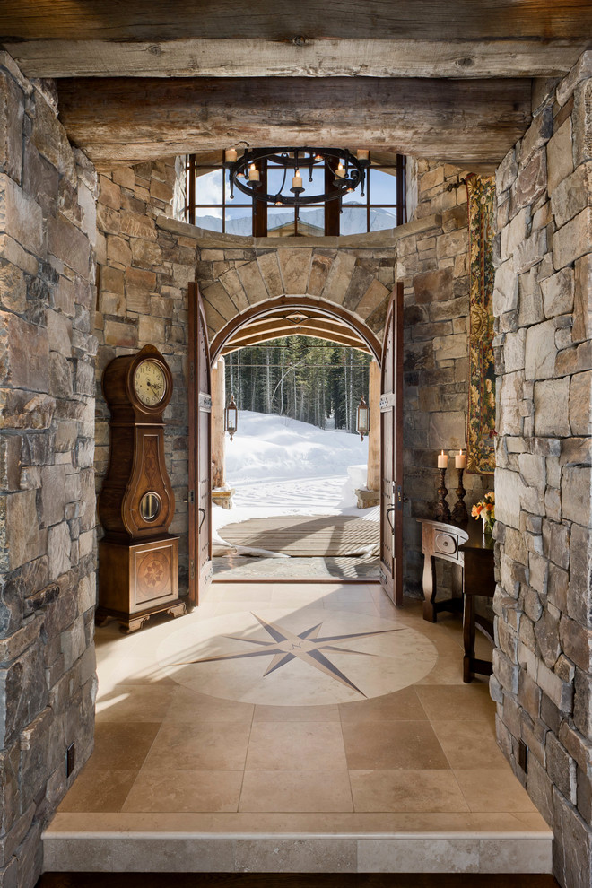 Inspiration for a rustic foyer in Other with a double front door.