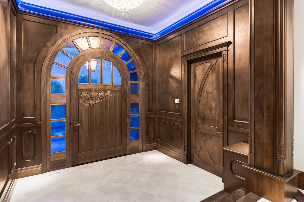 Medium sized classic foyer in Calgary with brown walls, porcelain flooring, a single front door, a dark wood front door and white floors.