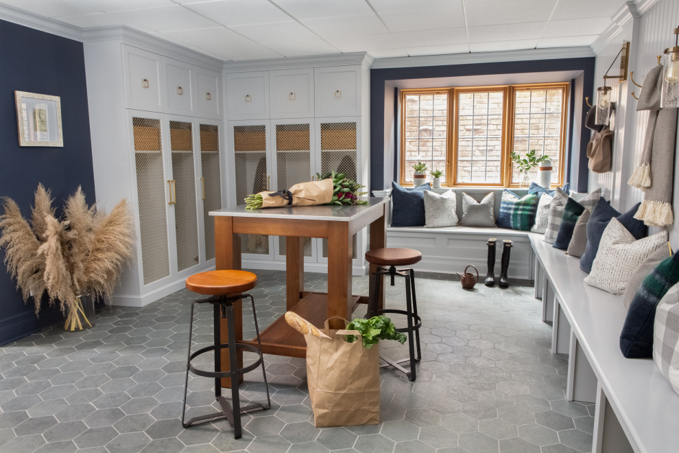 Expansive traditional entrance in New York with slate flooring and grey floors.
