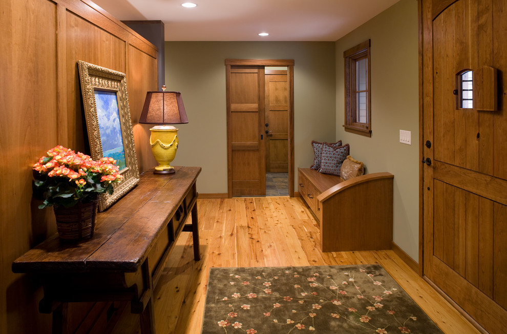 Elegant entryway photo in Minneapolis with green walls