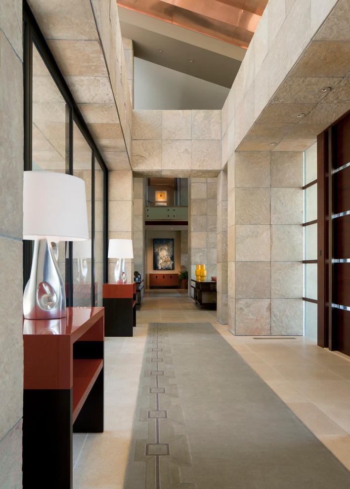 Contemporary entrance in Phoenix with feature lighting.