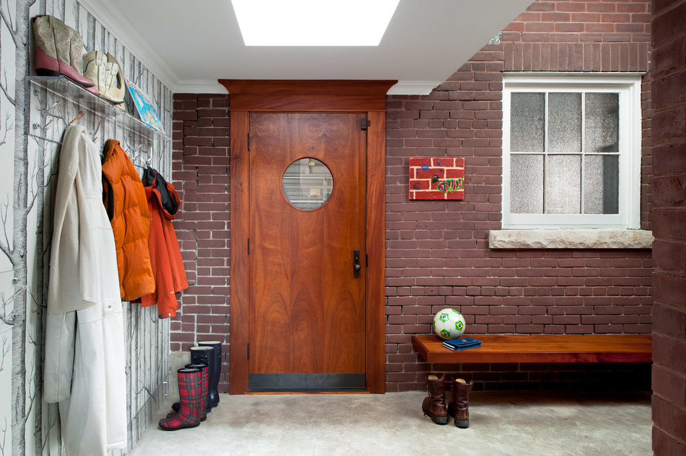 Example of an eclectic mudroom design in Toronto