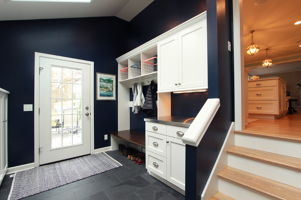 Navy Blue Mudroom off Kitchen with Ample Coat Storage Transitional