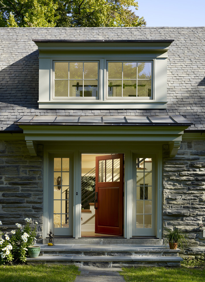 Traditional entrance in Philadelphia with a single front door and a medium wood front door.