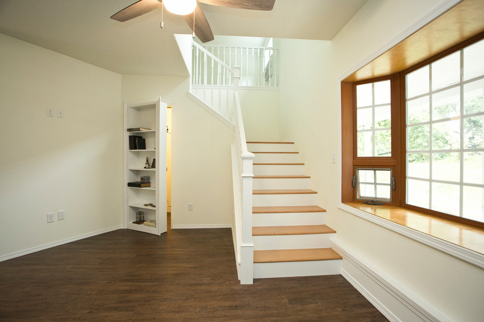 Photo of a medium sized traditional foyer in Portland with beige walls, dark hardwood flooring and brown floors.