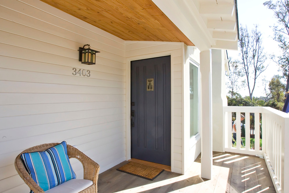 Example of a classic entryway design in San Diego with a blue front door