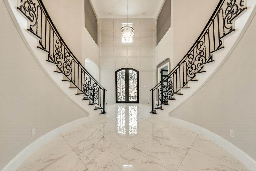 Large classic foyer in Dallas with grey walls, marble flooring, a double front door, a black front door and white floors.