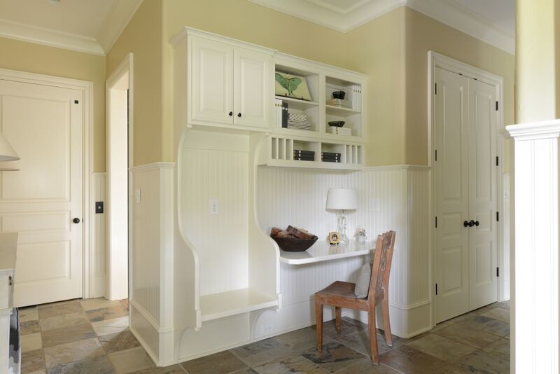 Example of a mid-sized classic foyer design in Other with beige walls