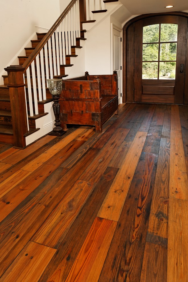 Entryway - traditional dark wood floor entryway idea in Baltimore with white walls and a dark wood front door