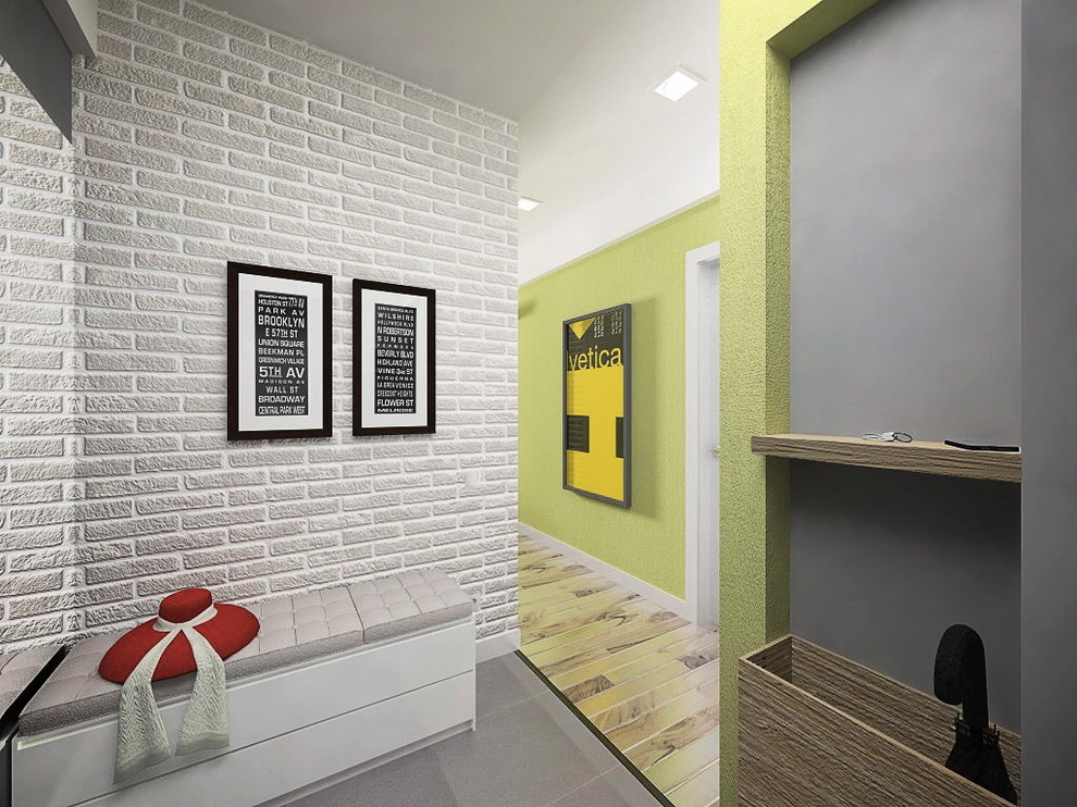 Inspiration för små moderna hallar, med gröna väggar, ljust trägolv, en enkeldörr och en vit dörr