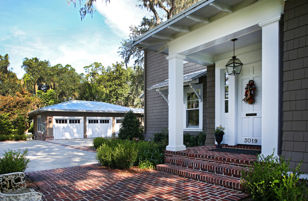 Inspiration for a classic front door in Jacksonville with brick flooring, a single front door and a white front door.