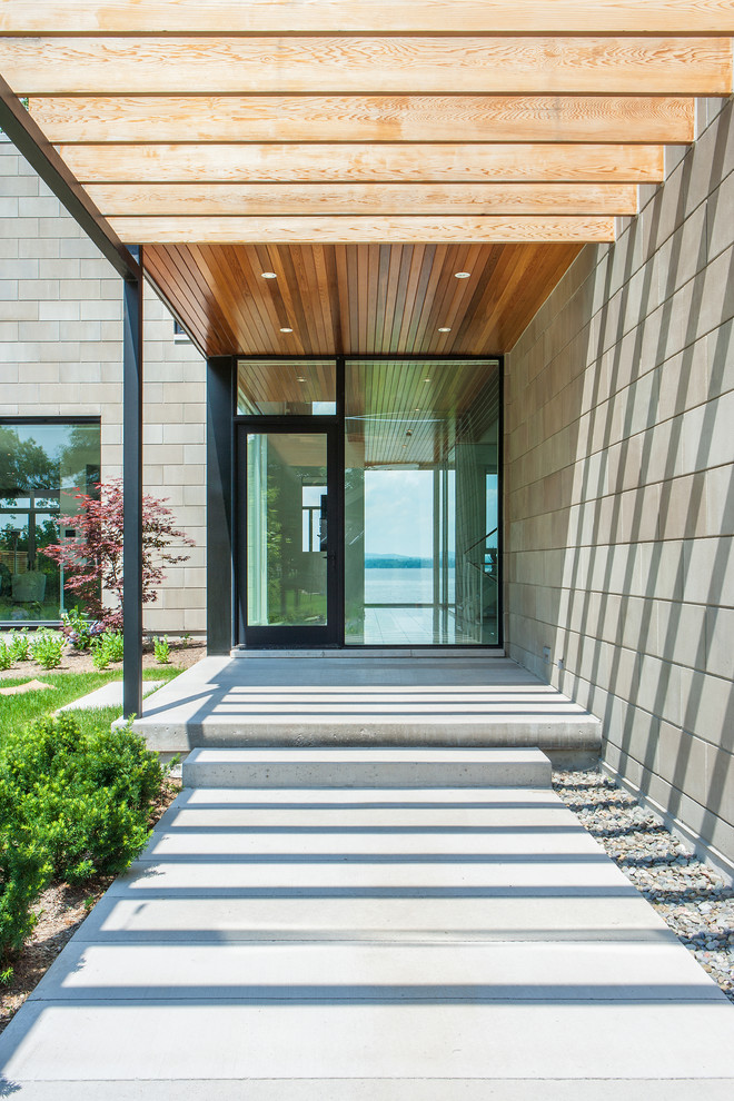 Entryway - contemporary entryway idea in Ottawa with a glass front door